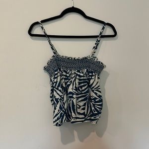 A flowy tank top with blue design